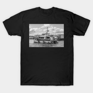 Crew transfer vessel motoring towards the sea in Great Yarmouth, Norfolk T-Shirt